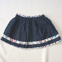 Red and Blue Flower/Navy with Silver Stars Reversible Skirt – Size 12-24 months